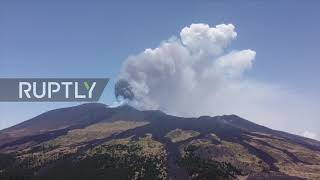 Italy: Column of ash rises as Etna eruption continues