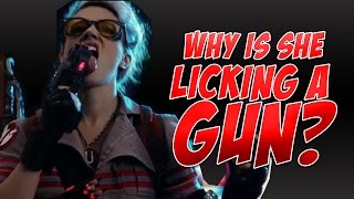 Ghostbusters 2016 - why is she licking a gun?