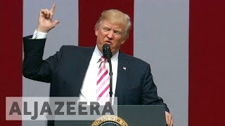 ?? US: Trump's feud with NFL players escalates