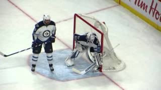 Michael Hutchinson in action during the Jets @ Senators hockey game
