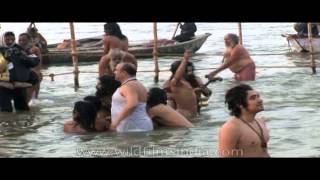 Devotees taking holy dip at Ardh Kumbh Mela