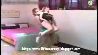 Sexy Girls playing lift and carry in the bed room