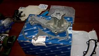 Замена помпы Nissan Almera N16