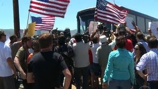 Immigrant children bussed to California amidst protests