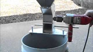 Drill powered nut cracker