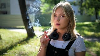 Sweet Polina is smoking 120mm cork cigarettes