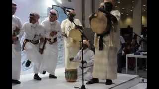 Music and dance ensemble from Rijal Alma, Asir, Saudi Arabia, in the Abu Dhabi Book Fair 2013.