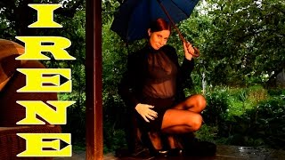 Modeling in high heels and back seam black pantyhose.