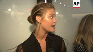 Emily Blunt and Sienna Miller sit front row at Michael Kors fashion show