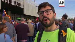 Supporters celebrate as ousted Catalan lawmakers arrive in Barcleona