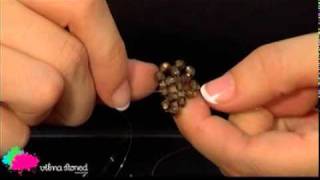 Anillo Swarovski 9 flores