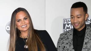 Chrissy Teigen wearing no knickers in daring thigh - Split Dress