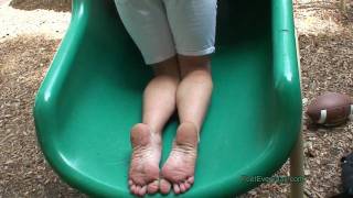Fun at the playground with dirty feet and wedge sandals.