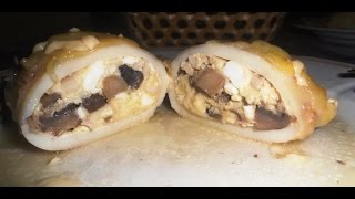 Кальмары фаршированные грибами и сыром