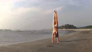 Beach Yoga Handstand Press in Goa with Kino