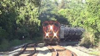 A CN C40-8 and 2 other Canadian National Engines Pull Empty Ethanol Cans Thru Shen