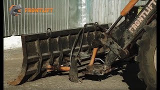 Погрузчик FRONTLIFT с челюстным ковшом, паллетными вилами и отвалом