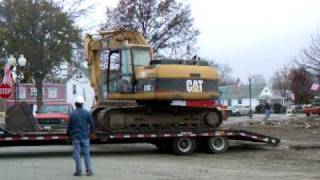 How to load an excavator