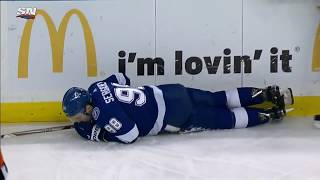 Troy Brouwer drops Alex Killorn with a flurry of right hands