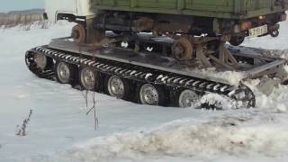 Уаз на гусеницах обкатка в поле глубокий снег.