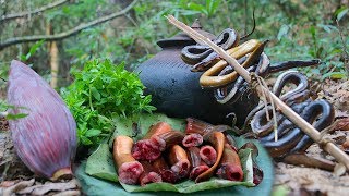 Primitive Technology: Find eel in river - Cooking eel banana soup eating delicious