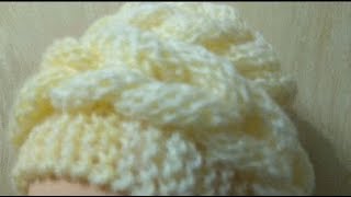 Вяжем спицами шапку с объёмными косами