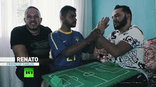 With no sight or hearing, one World Cup fan in Brazil still feels the vibe – with his friends' help