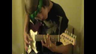 Adam playingthe Nick's guiatar