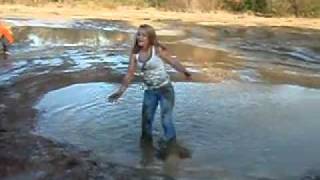 Wetlook hot girl in wet muddy jeans