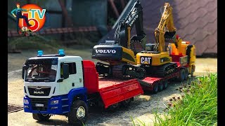 BRUDER Truck Excavator Volvo and CAT transport to construct!