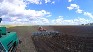 121-Д.(2С.).Из-за дождя пересел с МАЗа на Т-150К на культивацию паров.