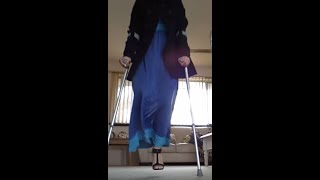 Amputee Woman One Leg Heel Crutches and Stump