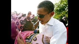 Former President Barack Obama dances with Mama Sarah Obama