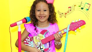 Valentina Plays with Disney Barbie Toy Guitar and Starts a Band