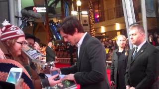 Nicholas Hoult signs autographs for fans