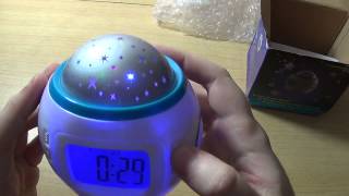 Беглый обзор будильника с прожектором UI-1038.