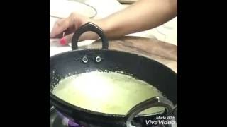 Poori/Puri frying - puffed Indian bread (deep fried)