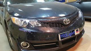 Toyota Camry. Замена линз на биксеноновые линзы Hella.