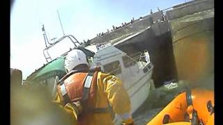 RNLI Brighton Lifeboat rescue family and stricken motor cruiser