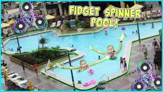 JAYLA AND AYDAH DIVE INTO A 100FT FIDGET SPINNER POOL!!
