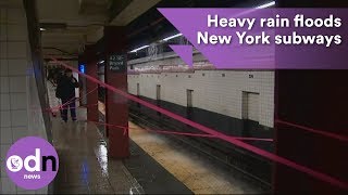 Heavy rain floods New York subways