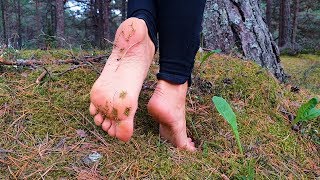 Bare feet girl walks in the forest 4k