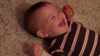 Conner laughing while mommy tickles his feet!