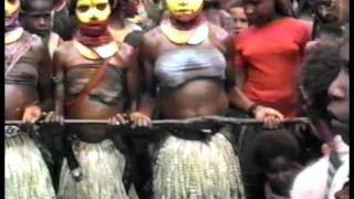 Papua New Guinea - Huli girls Traiditional Mali dance - Village of Pureni