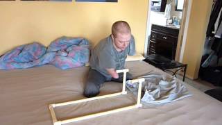 Quad Amputee uses Dressing Assistance Device (DAD) to put his Pants on