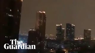 'Wuhan jiāyóu': chants of solidarity spread across city at epicentre of coronavirus