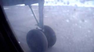 2009-12-26 Takeoff from Mirnyi's airport Взлет самолета из Мирного