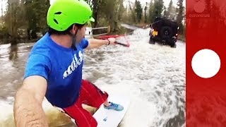 Wakeboard, drone & 4x4: UK daredevils have fun on flooded road