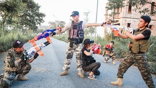 Game Nerf War : Special Police Winter Warriors Nerf Guns | Fight Attack Criminal Group