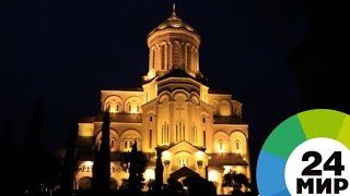 «Алило» и древний храм в горах: как в Грузии празднуют Рождество - МИР 24